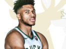 Giannis Antetokounmpo olhando de lado posado