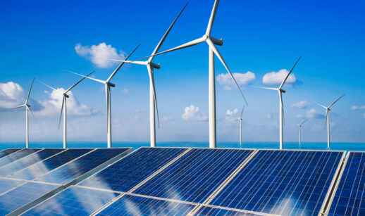 painéis solares e turbinas eólicas, alusivo à transição energética